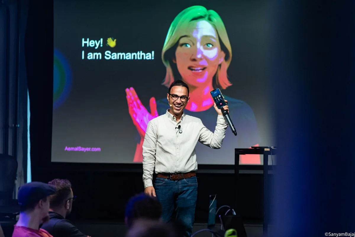 Aemal celebrating a working voice AI demo in front of workshop attendees